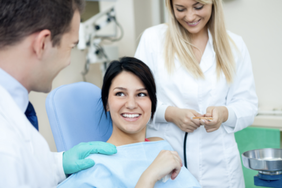 Woman Sitting On Dental ChairWoman Sitting On Dental Chair