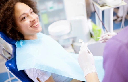 Patient receiving comfortable tooth extraction treatment