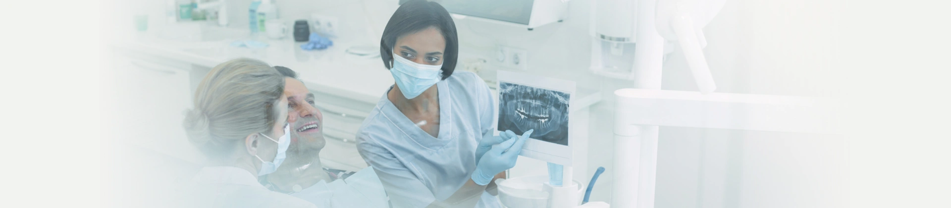 Dental team providing care to a patient
